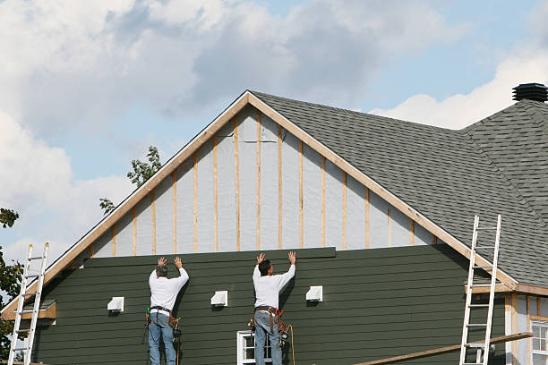 Professional Siding Contractor technician working in Ardara, PA